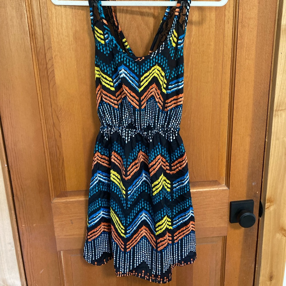 Dress with criss cross back detail.